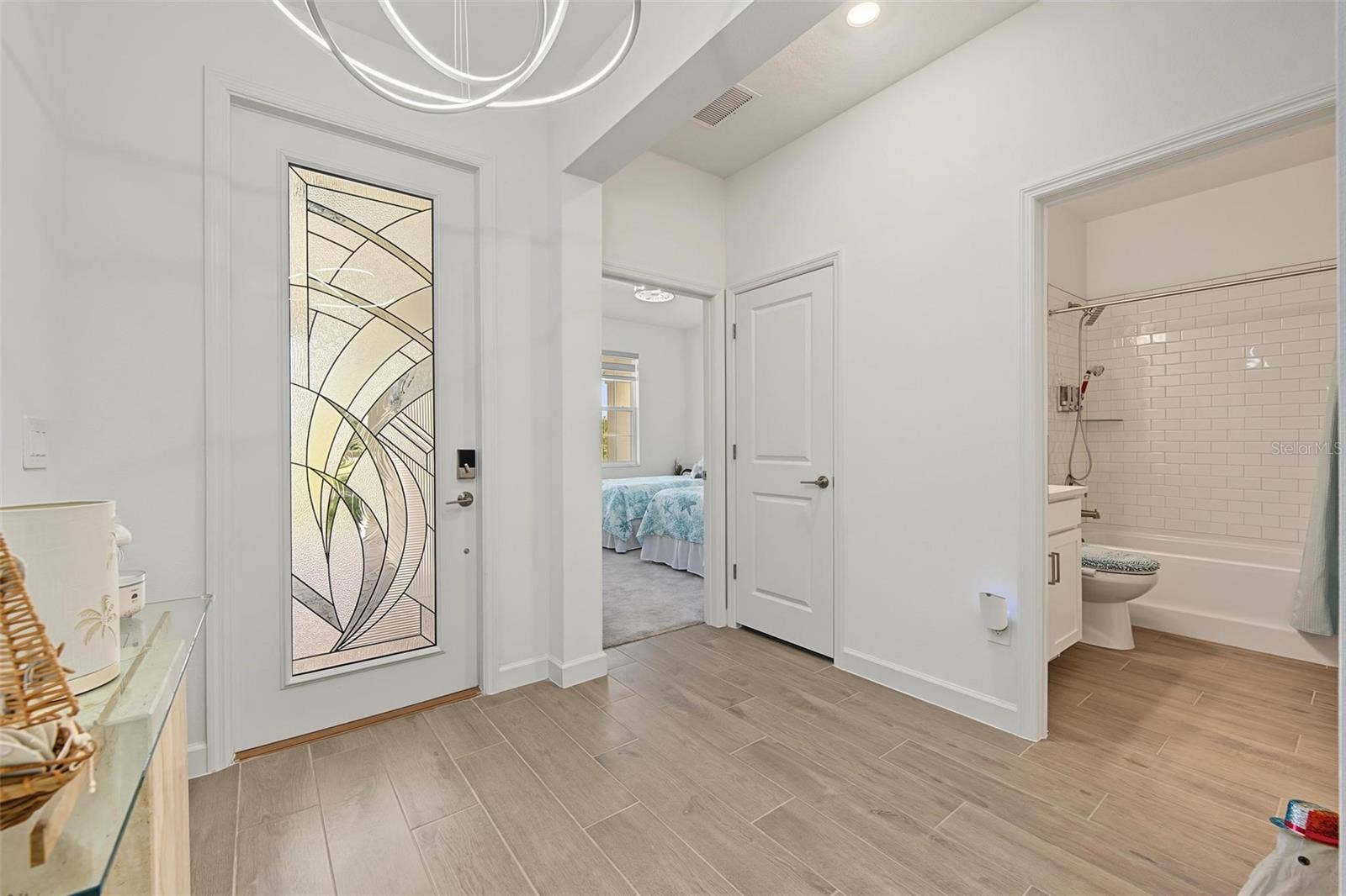Entry w/full glass door & upgraded lighting