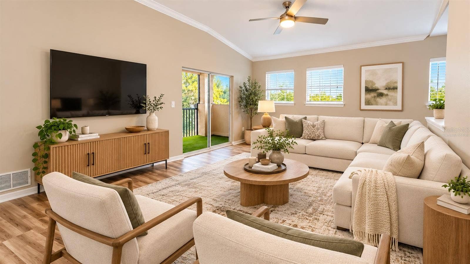 10209 COURTNEY PALMS BOULEVARD, #301, Tampa, FL 33619 Living Room Virtually Staged