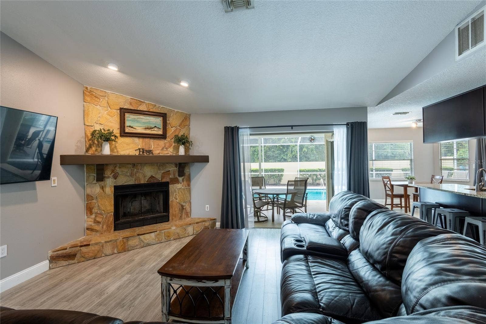 9713 LOMALINDA COURT, New Port Richey, FL 34655 The great room is open to the kitchen and dinette area.