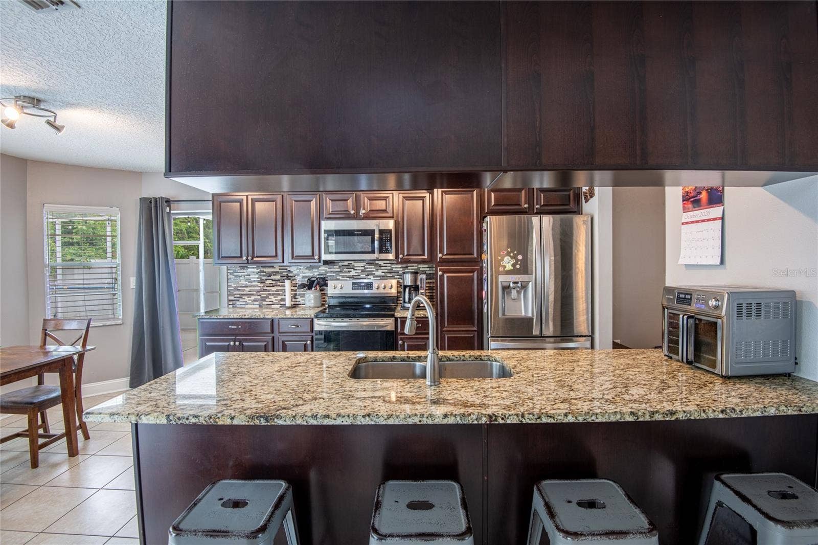 9713 LOMALINDA COURT, New Port Richey, FL 34655 Newer oven and microwave.