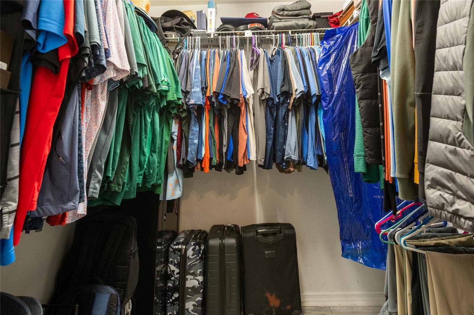 9713 LOMALINDA COURT, New Port Richey, FL 34655 Walk-in closet in primary suite.