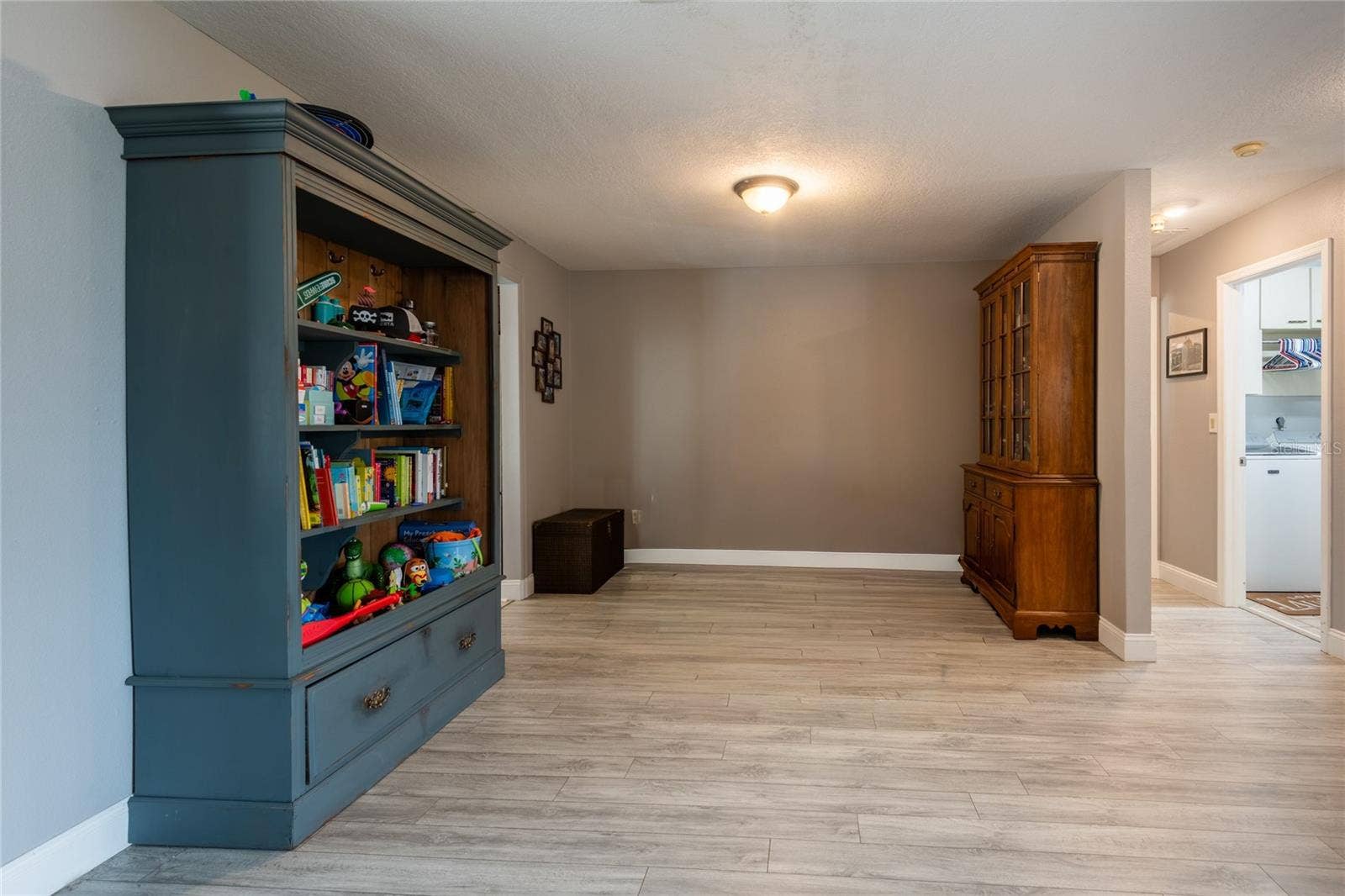 9713 LOMALINDA COURT, New Port Richey, FL 34655 Dining room being used as a kid's play area.