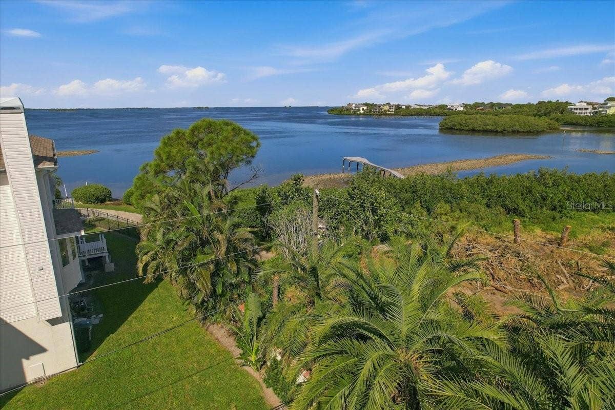 402 ORCHID LANE, Palm Harbor, FL 34683 BUILD UP AND THIS COULD BE YOUR NORTH WEST GULF FRONT WATER VIEW!