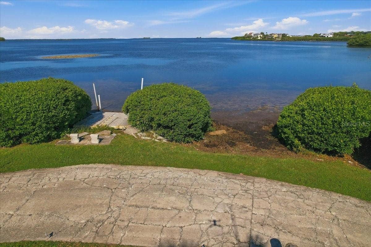 402 ORCHID LANE, Palm Harbor, FL 34683 LAUNCH YOUR PADDLE BOARD OR KAYAK FROM THIS COMMUNITY LAUNCH JUST AROUND THE CORNER!