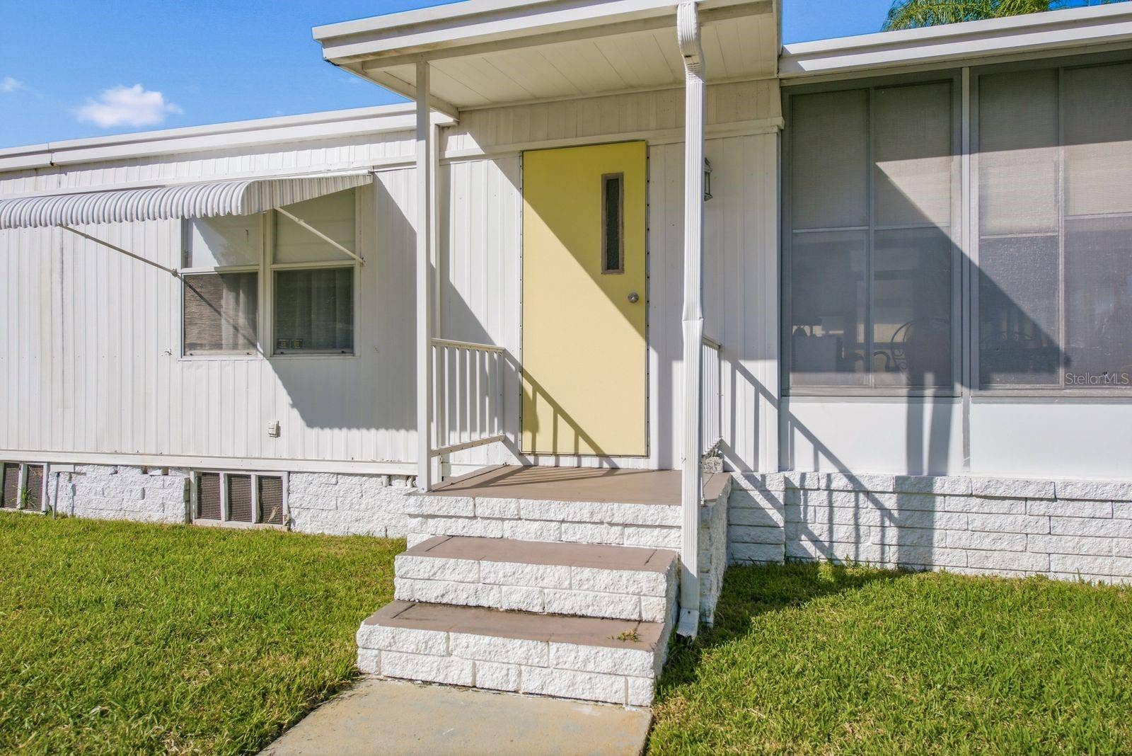 203 SEAGULL DRIVE, Tarpon Springs, FL 34689 Side Door