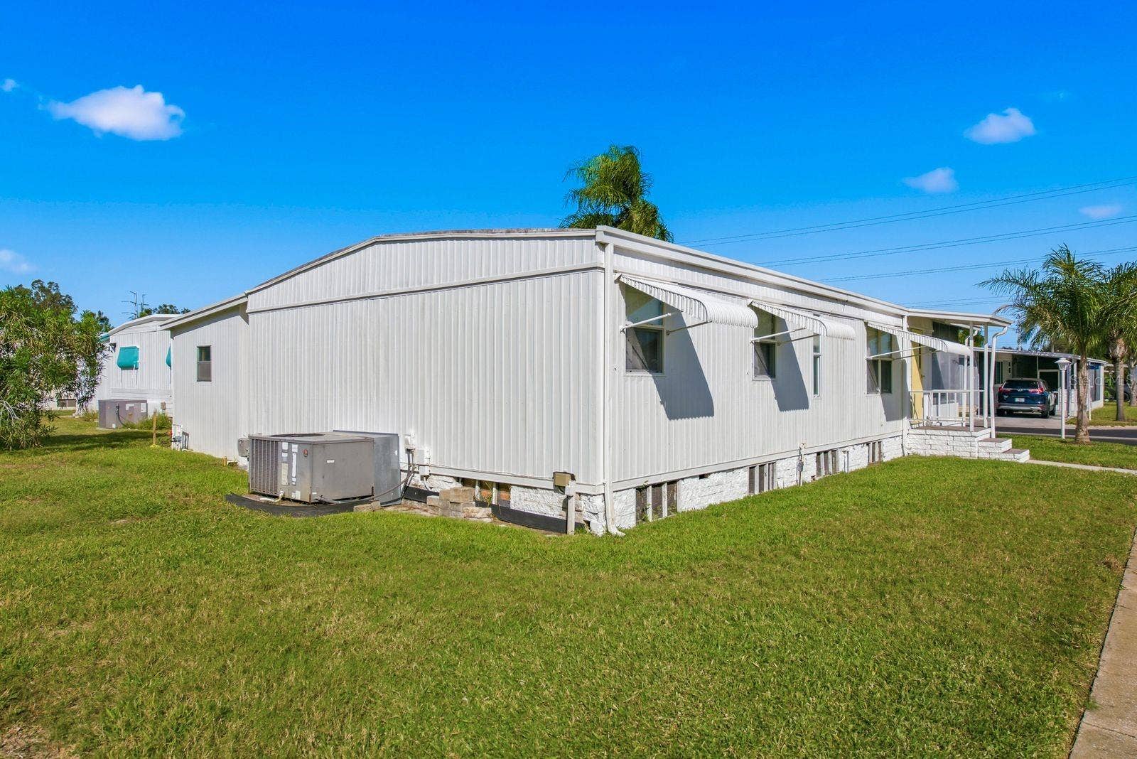 203 SEAGULL DRIVE, Tarpon Springs, FL 34689 Side and Back exterior