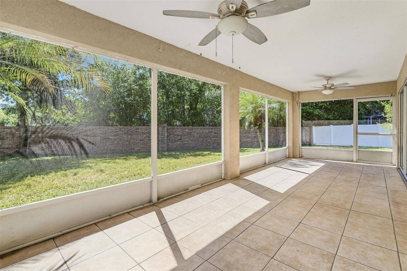 29002 OLD MARSH, Wesley Chapel, FL 33543 PATIO WITH 2 CEING FANS