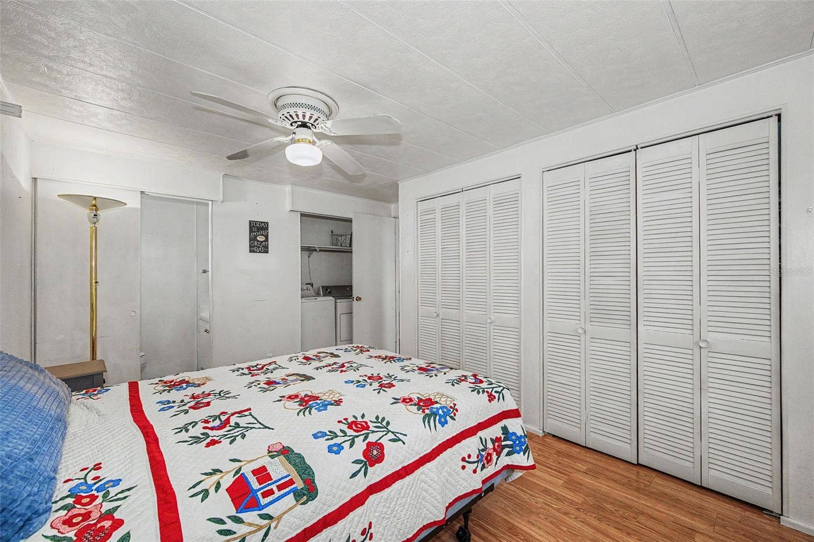 18 DRURY LANE, Tarpon Springs, FL 34689 Primary bdrm w/ensuite bath and laundry closet