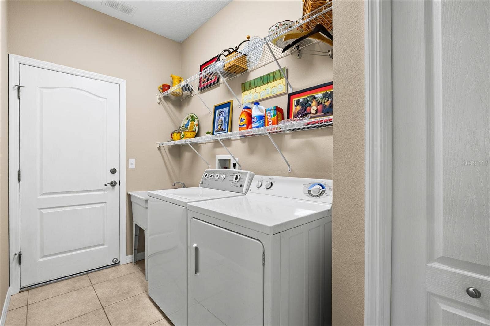 2057 INVERNESS GREENS DRIVE, Sun City Center, FL 33573 Laundry Room