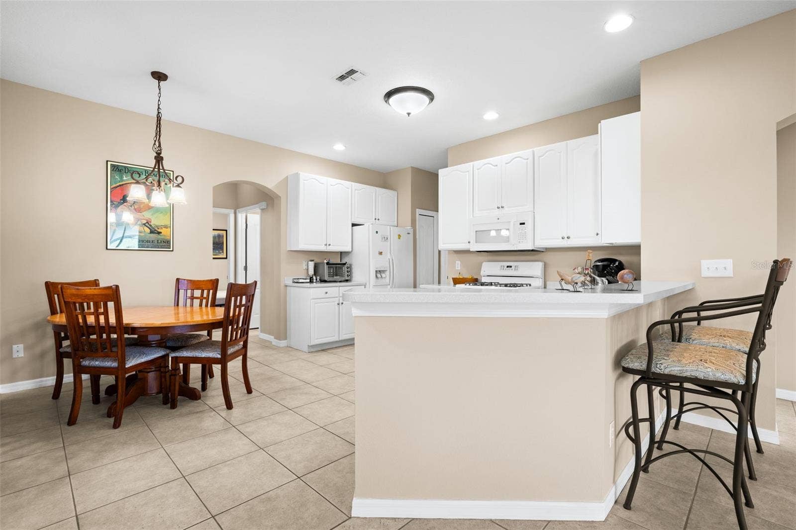 2057 INVERNESS GREENS DRIVE, Sun City Center, FL 33573 Kitchen and Dining Space