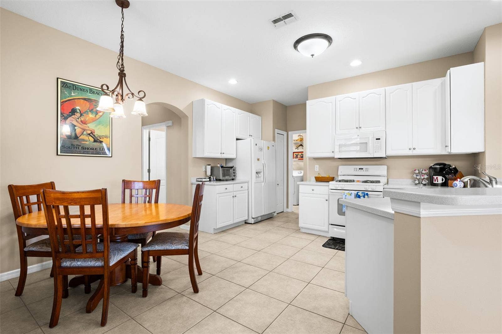 2057 INVERNESS GREENS DRIVE, Sun City Center, FL 33573 Kitchen and Dining Space