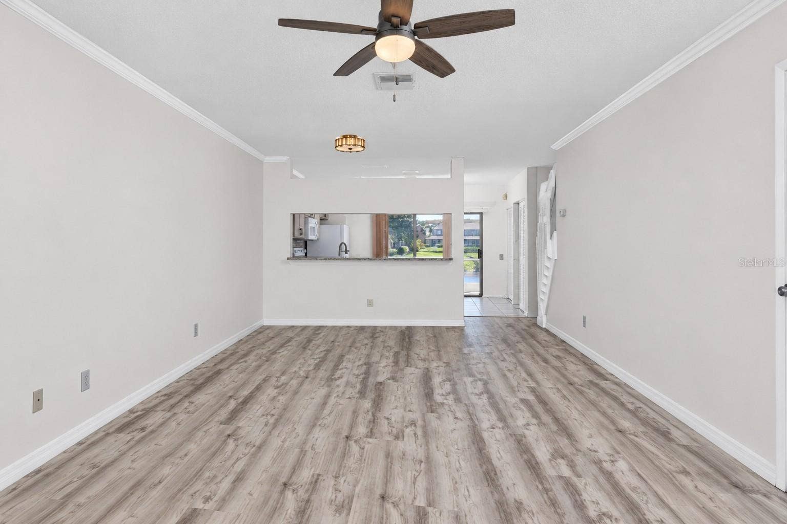 6229 BAYSIDE KEY DRIVE, Tampa, FL 33615 Open concept living area with Luxury Vinyl Plank -6229 Bayside Key Dr, Tampa, FL 33615