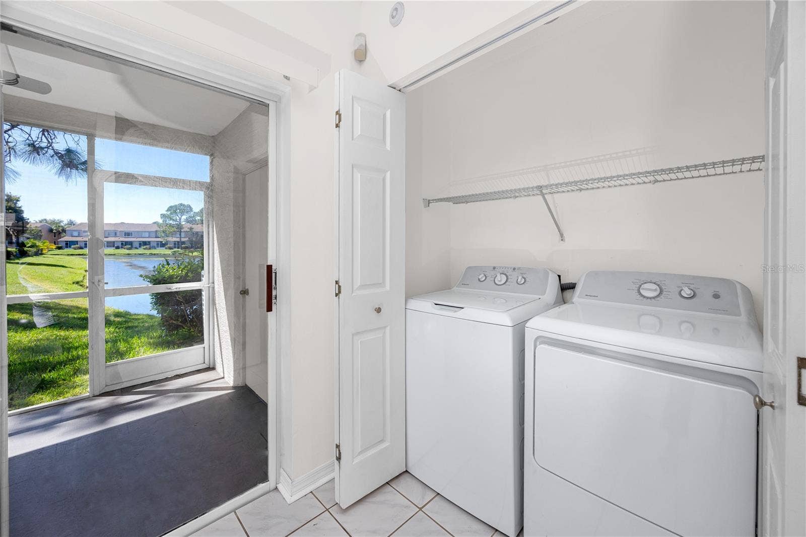6229 BAYSIDE KEY DRIVE, Tampa, FL 33615 Laundry Closet with Full size washer and dryer -6229 Bayside Key Dr, Tampa, FL 33615