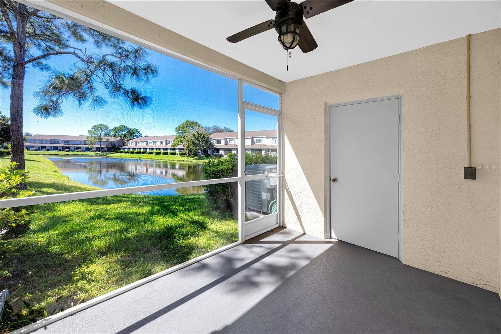 6229 BAYSIDE KEY DRIVE, Tampa, FL 33615 Lanai with Pond Views -6229 Bayside Key Dr, Tampa, FL 33615