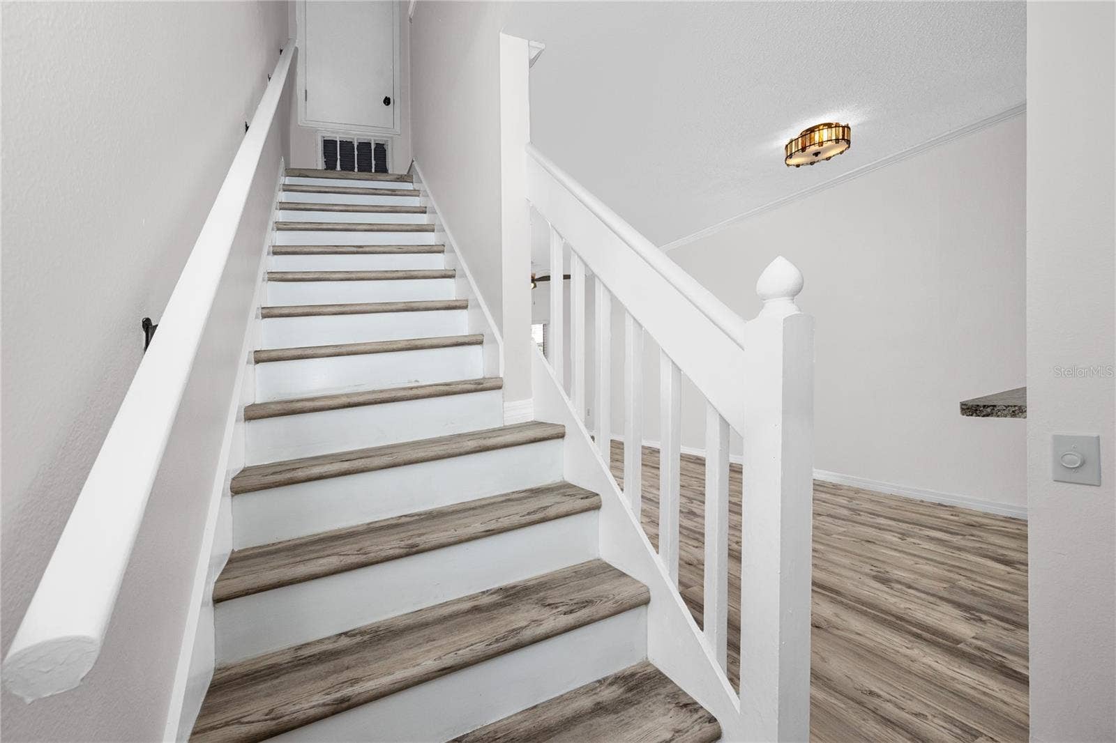 6229 BAYSIDE KEY DRIVE, Tampa, FL 33615 Staircase with Luxury Vinyl Plank -6229 Bayside Key Dr, Tampa, FL 33615
