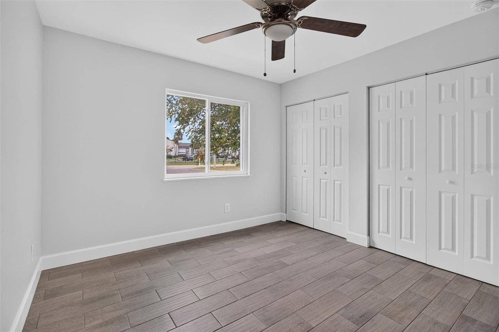 876 116TH AVENUE N, #103, St Petersburg, FL 33716 Bedroom two with double closets