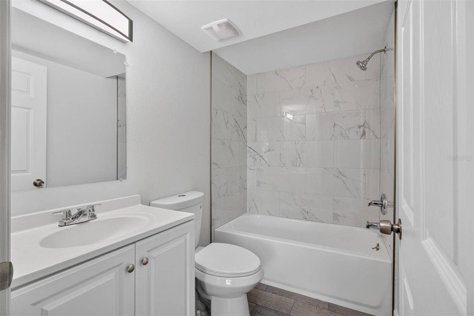 876 116TH AVENUE N, #103, St Petersburg, FL 33716 Guest bath