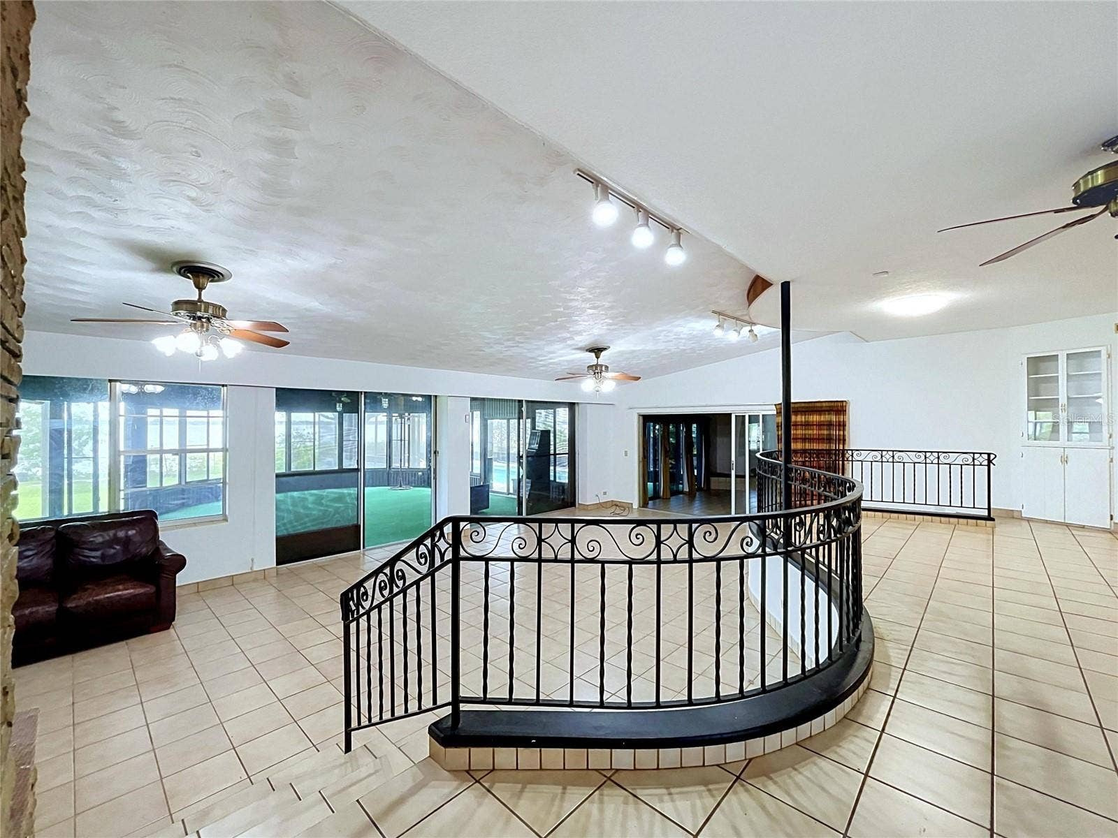 1348 EDGEWATER BEACH DRIVE, Lakeland, FL 33805 Living room with views toward the kitchen