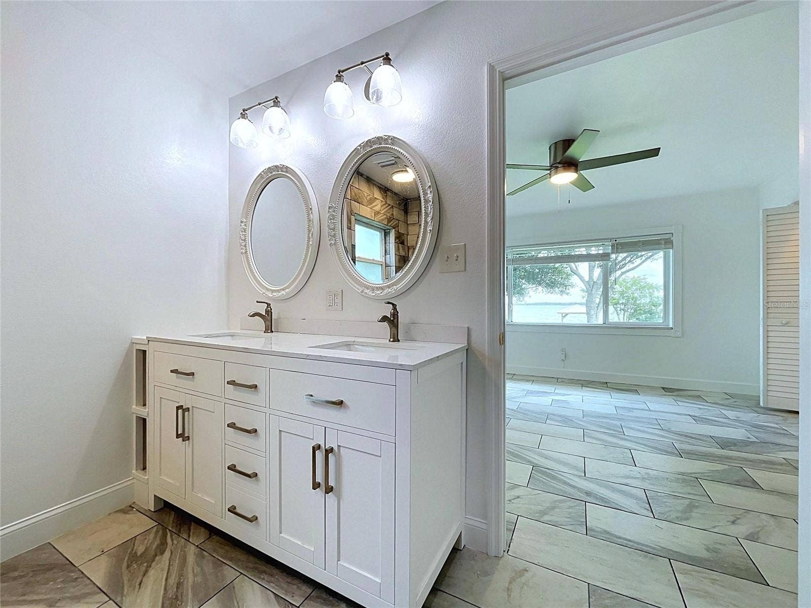 1348 EDGEWATER BEACH DRIVE, Lakeland, FL 33805 Bathroom 1 vanity and adjoining shower