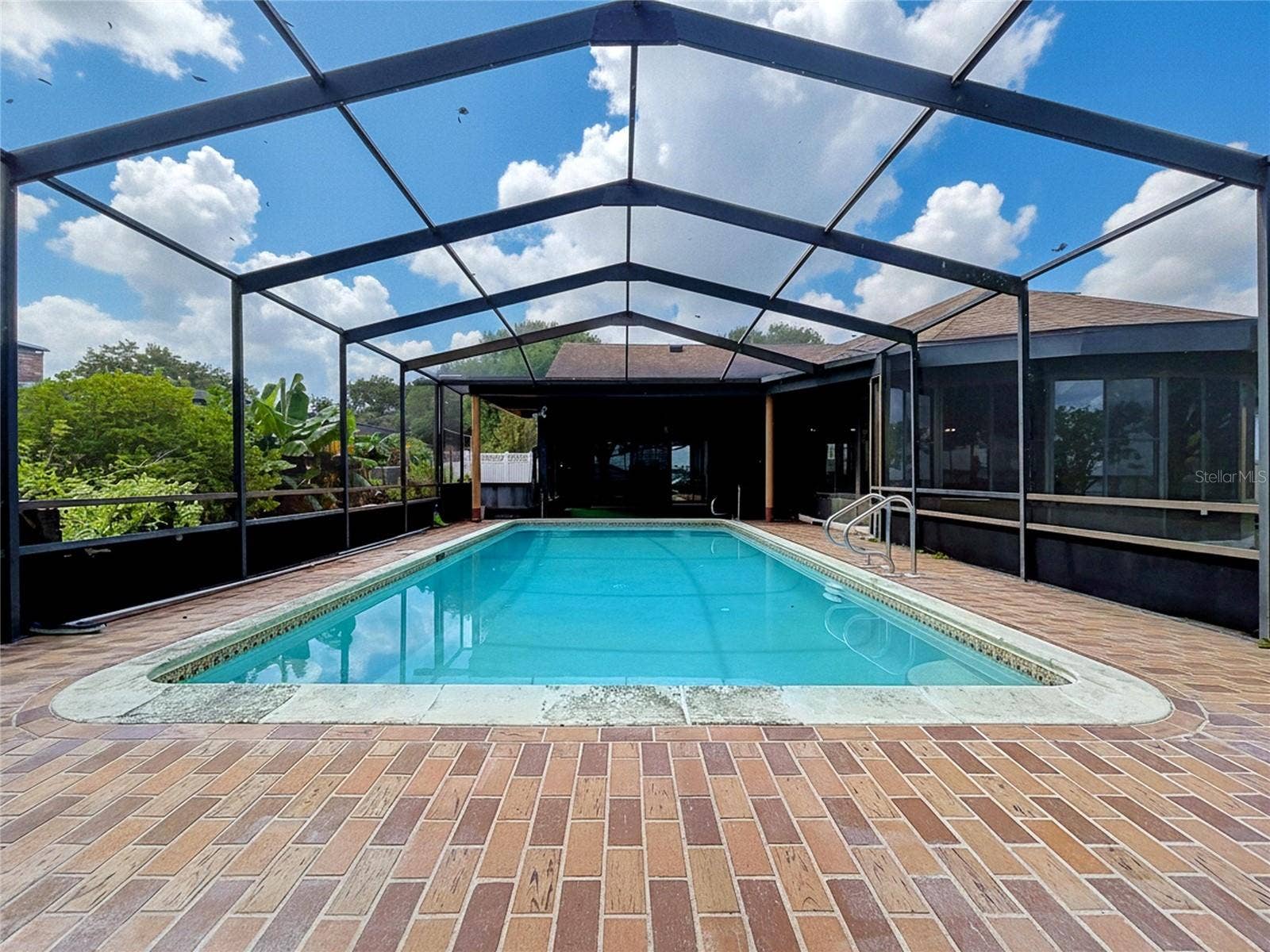 1348 EDGEWATER BEACH DRIVE, Lakeland, FL 33805 In-ground pool with screened enclosure