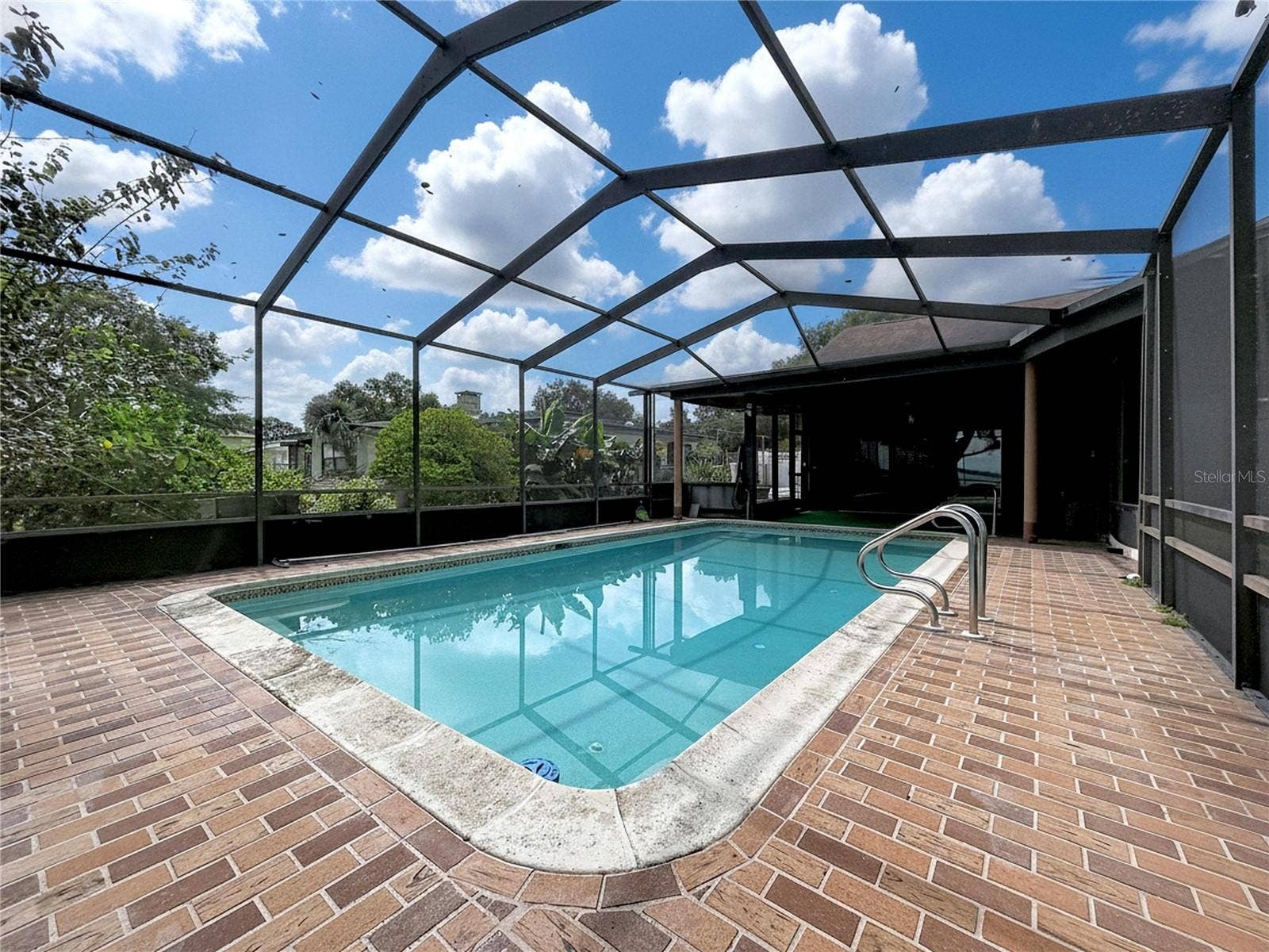 1348 EDGEWATER BEACH DRIVE, Lakeland, FL 33805 In-ground pool with screened enclosure