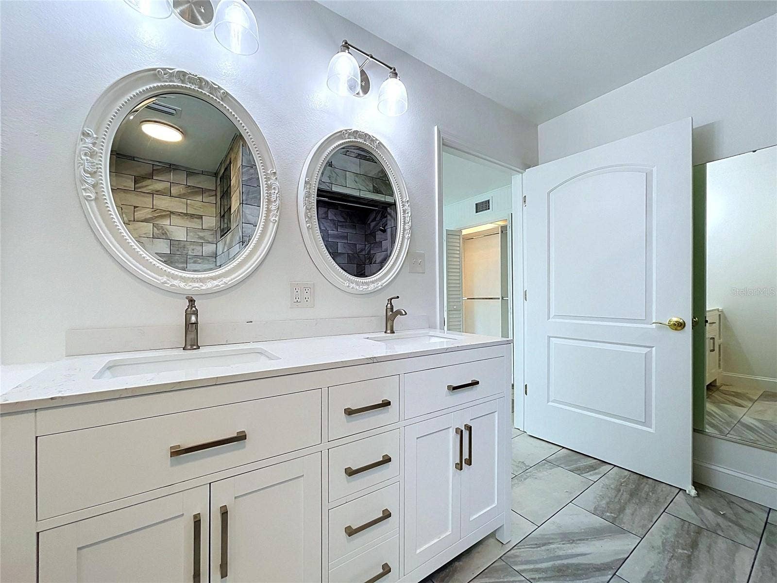 1348 EDGEWATER BEACH DRIVE, Lakeland, FL 33805 Bathroom 1 vanity with dual mirrors