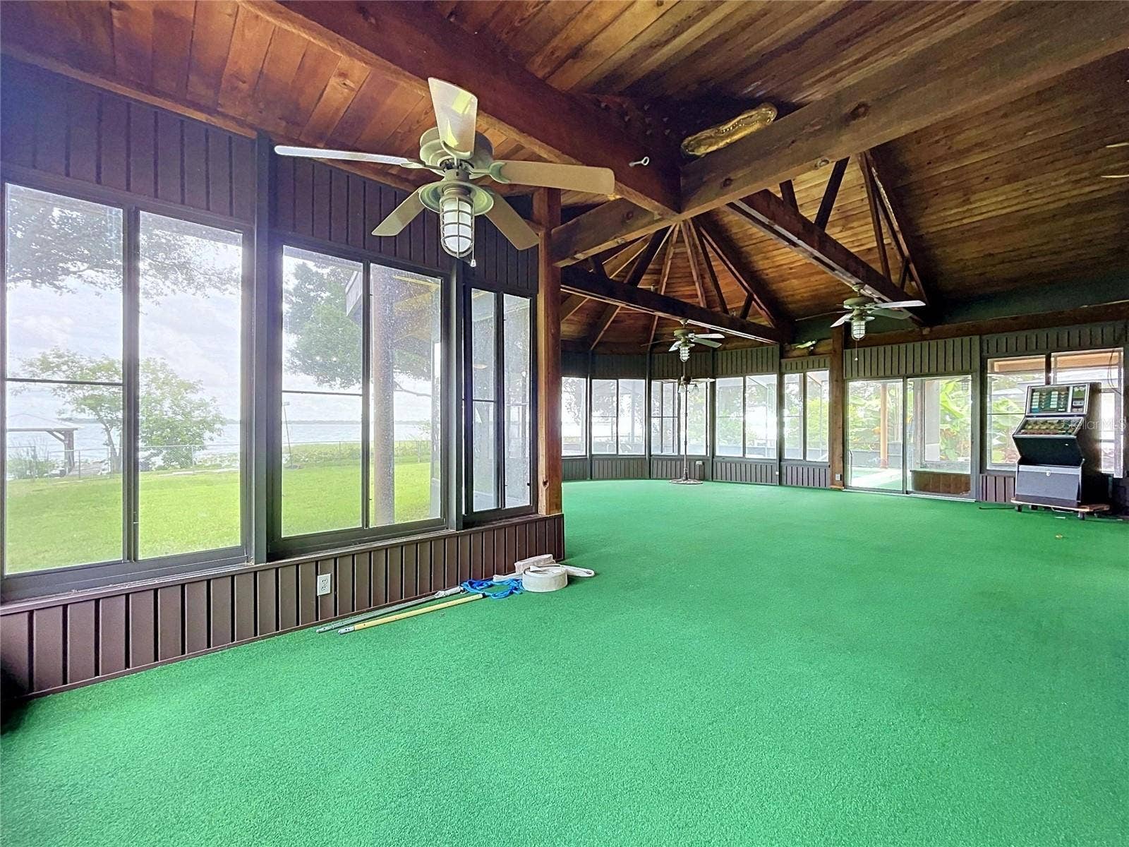 1348 EDGEWATER BEACH DRIVE, Lakeland, FL 33805 Lanai with large windows and vaulted wood ceiling