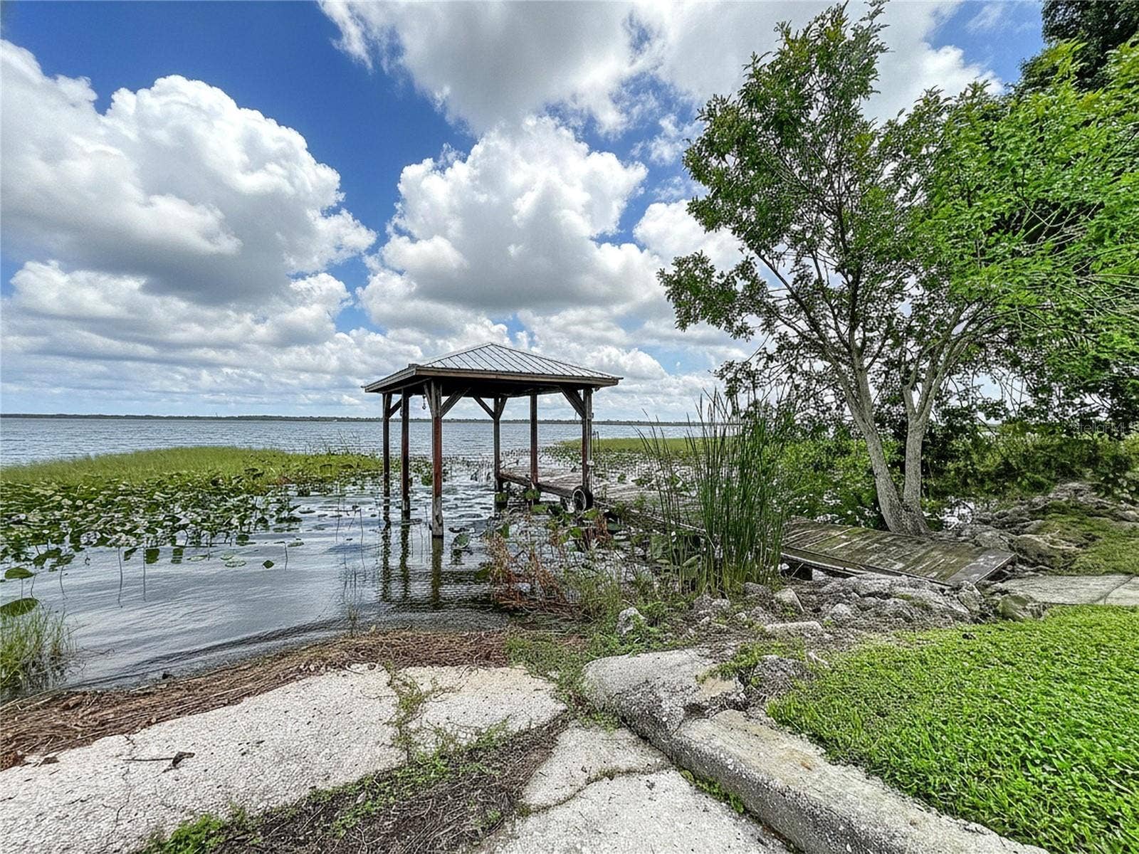 1348 EDGEWATER BEACH DRIVE, Lakeland, FL 33805 Lakefront view and dock and ramp