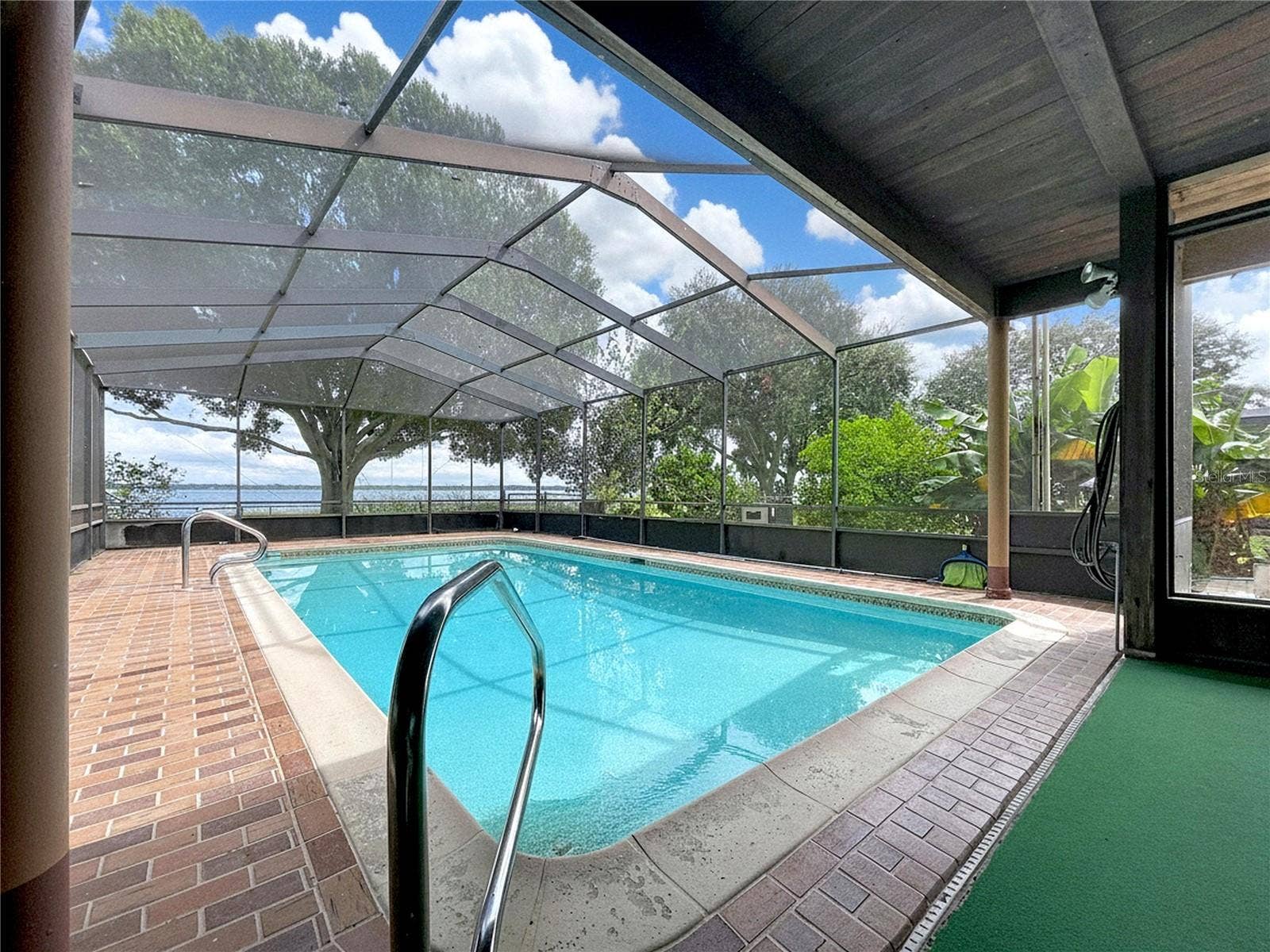 1348 EDGEWATER BEACH DRIVE, Lakeland, FL 33805 In-ground pool with screened enclosure