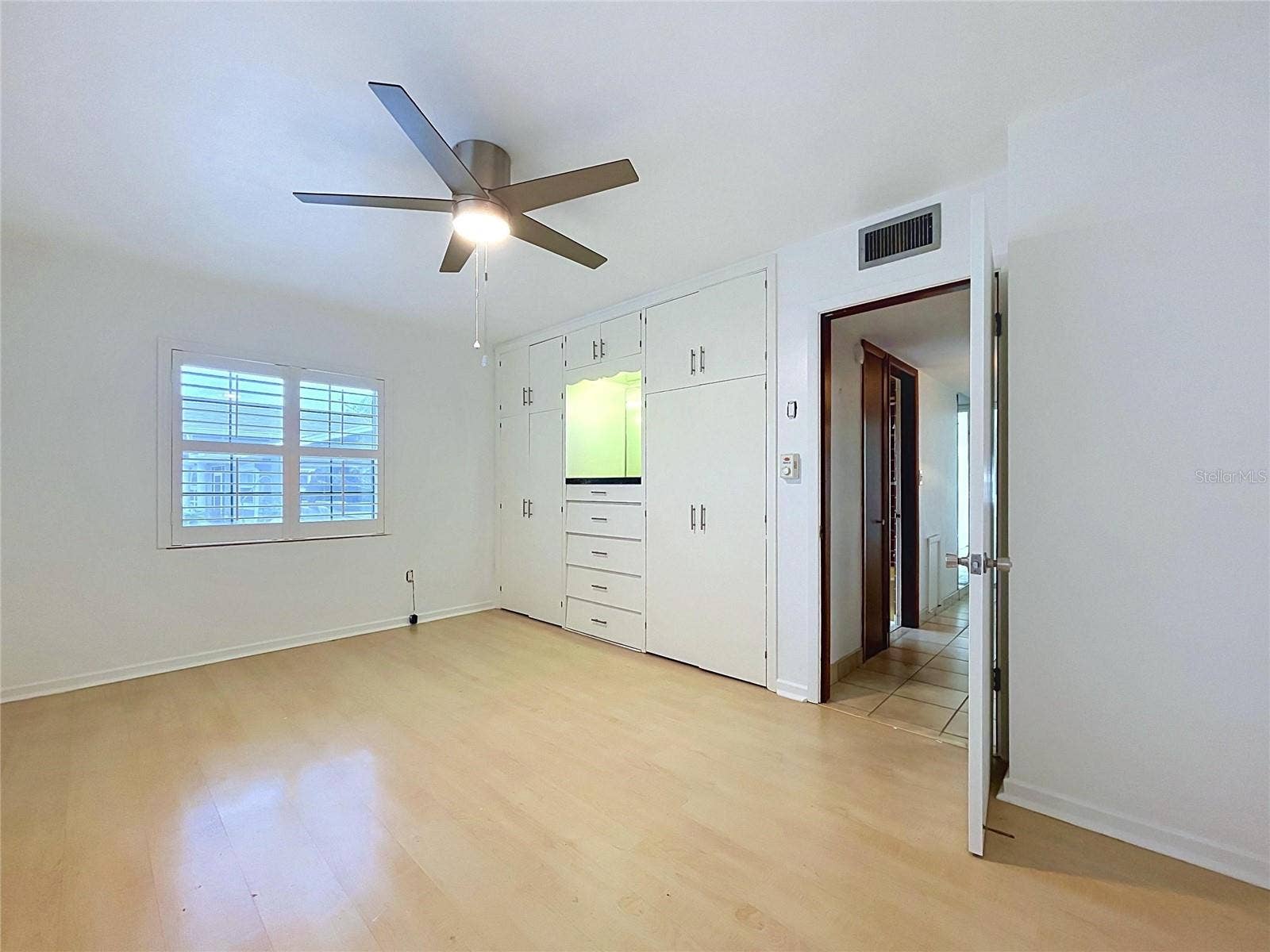 1348 EDGEWATER BEACH DRIVE, Lakeland, FL 33805 Bedroom 2 with ceiling fan and windows