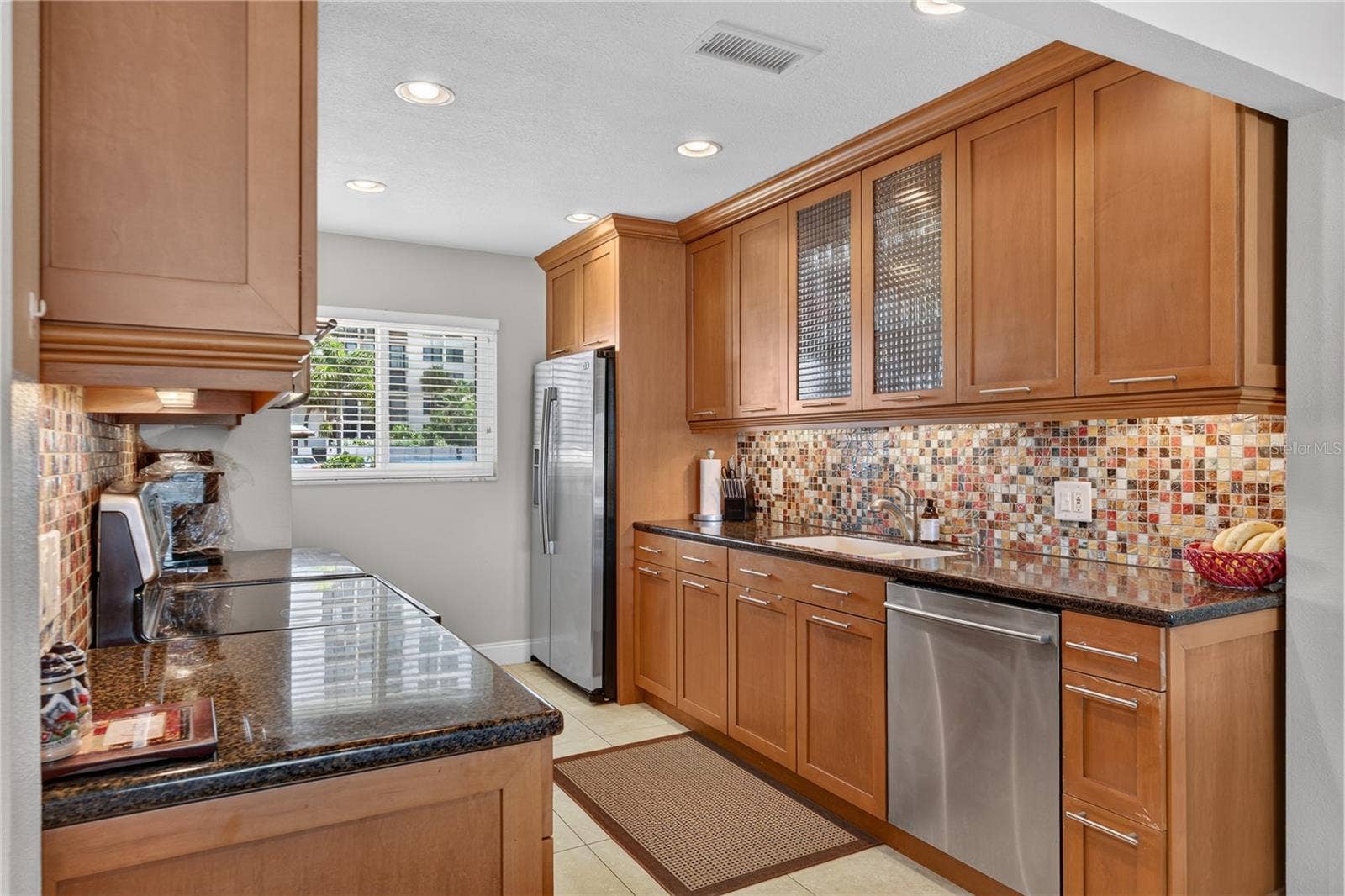 400 LARBOARD WAY, #106, Clearwater, FL 33767 Kitchen with large windows letting in an abundance of light.