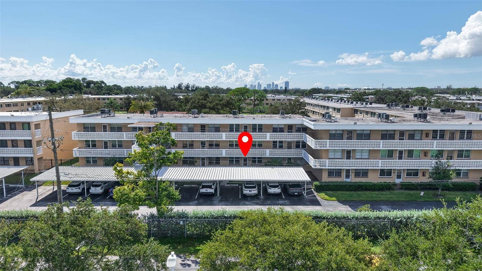 5095 BAY STREET NE, #104, St Petersburg, FL 33703 Front of the building with views of downtown St. Pete.