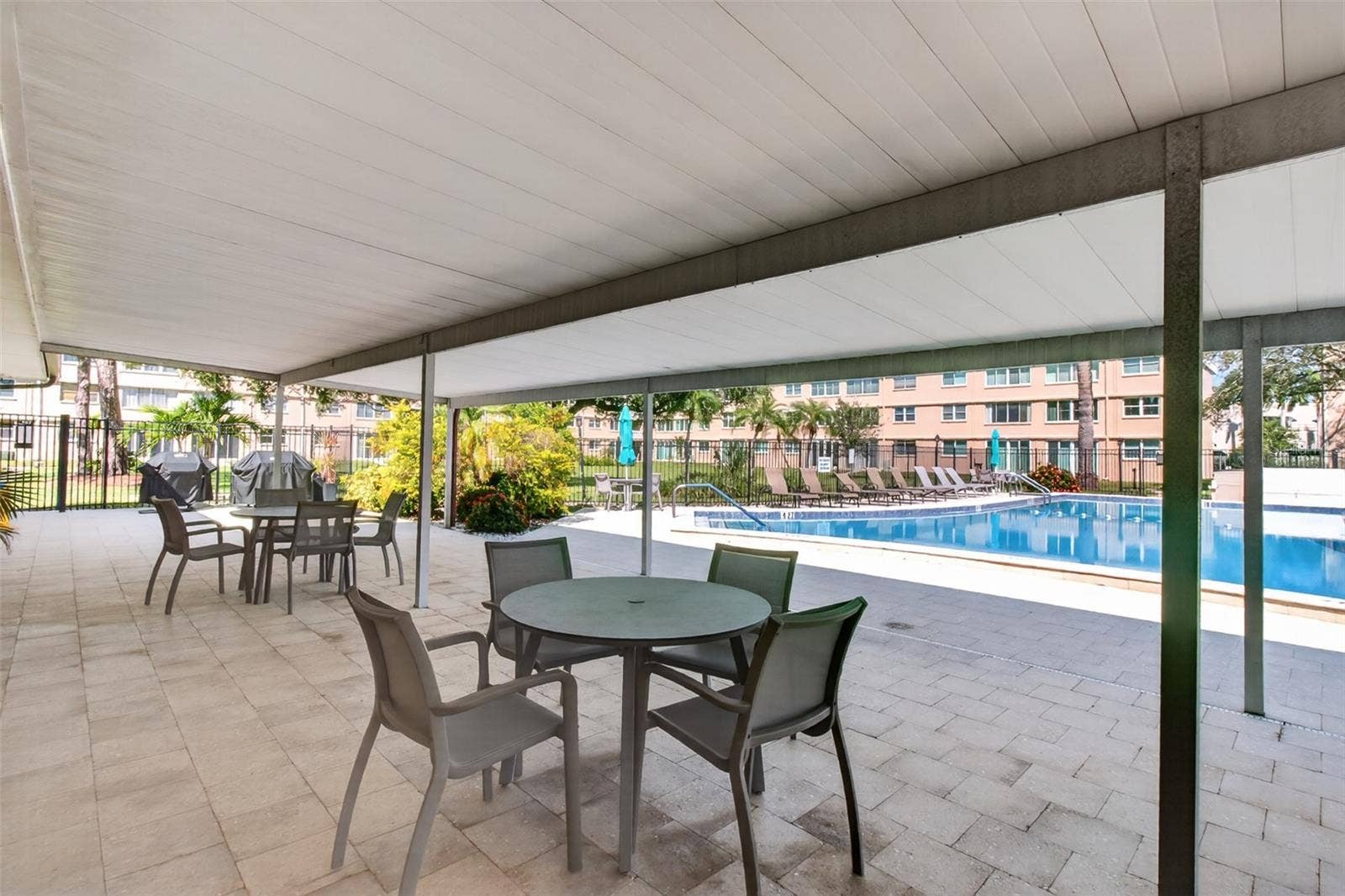 5095 BAY STREET NE, #104, St Petersburg, FL 33703 Alfresco dining by the pool