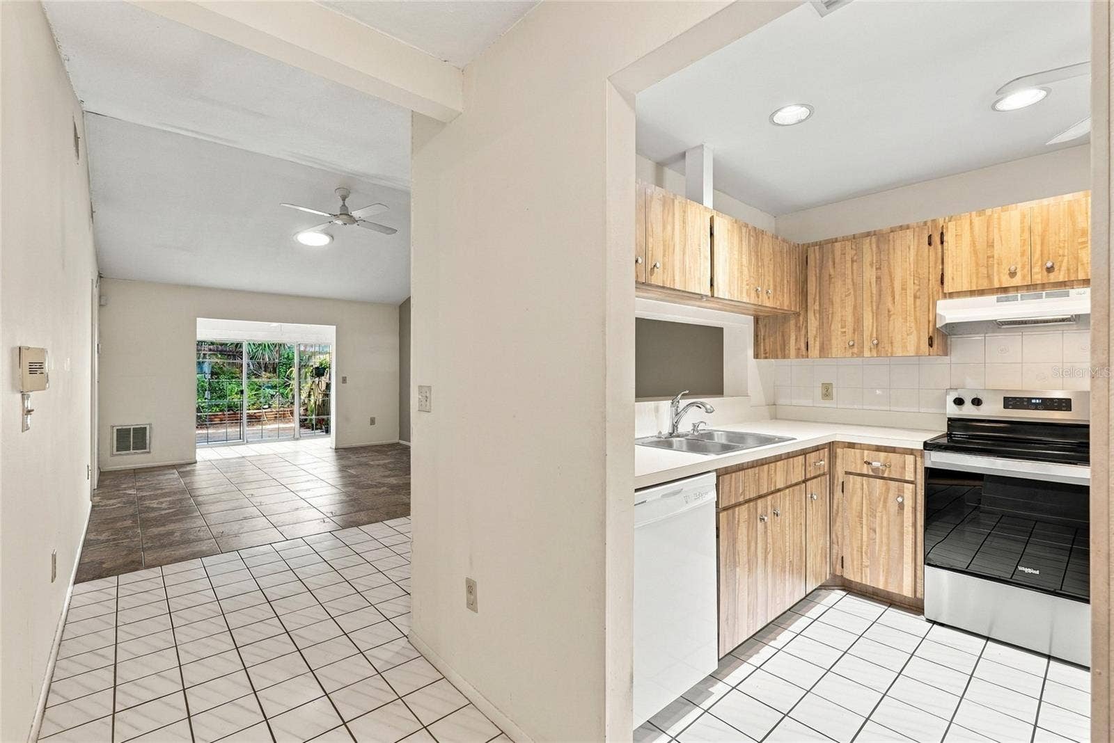 1111 THAYER STREET, #1111, Safety Harbor, FL 34695 Kitchen with Living room in background