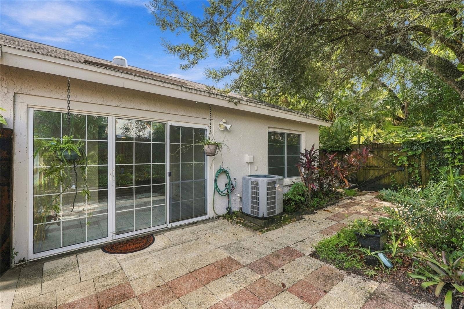 1111 THAYER STREET, #1111, Safety Harbor, FL 34695 Backyard with pavers