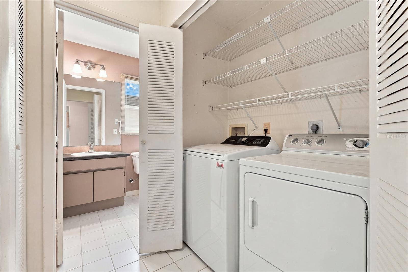 1111 THAYER STREET, #1111, Safety Harbor, FL 34695 Laundry closet in Hallway
