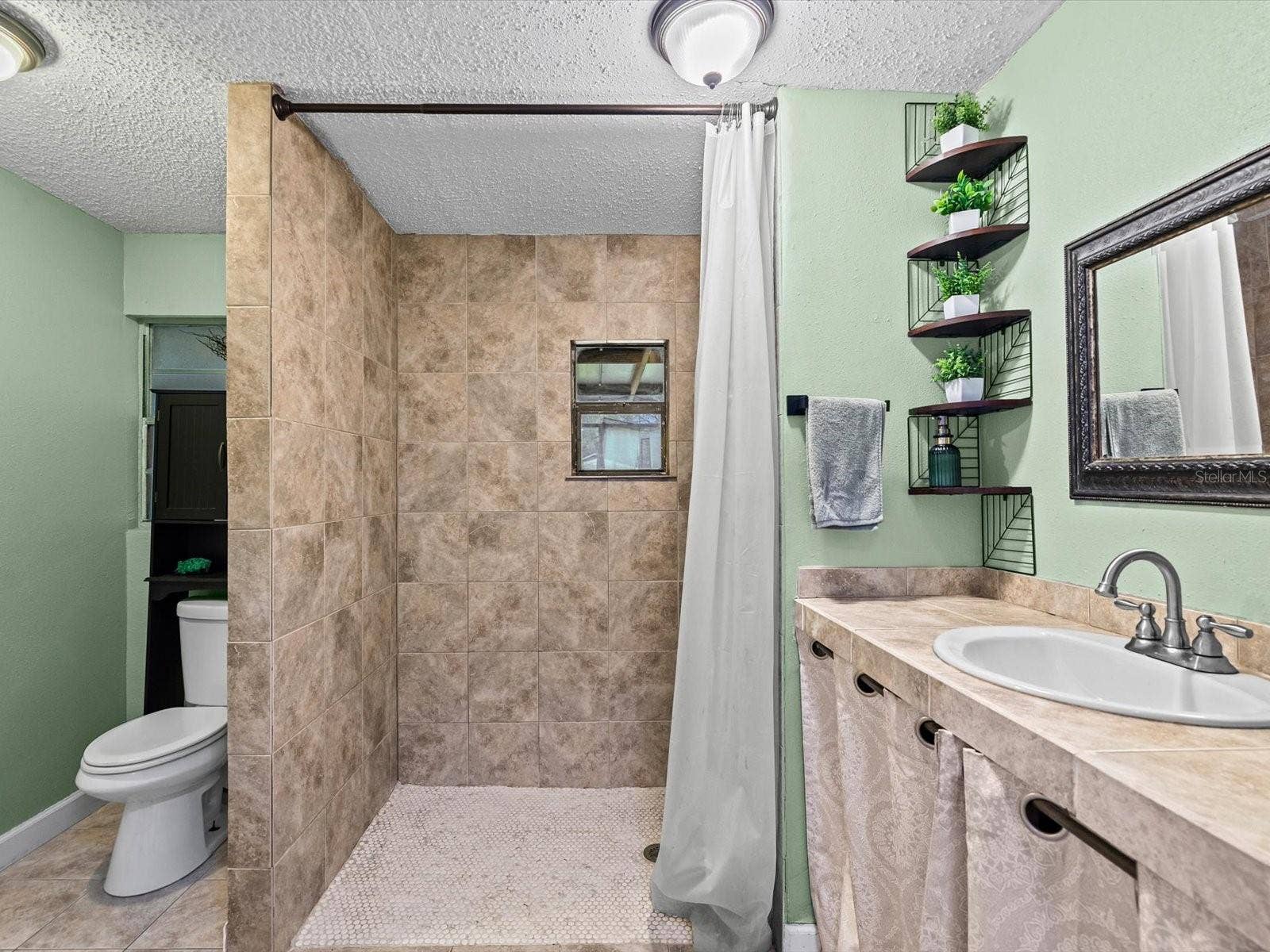910 E ESKIMO AVENUE, Tampa, FL 33604 910 E ESKIMO AVENUE, Tampa, FL 33604