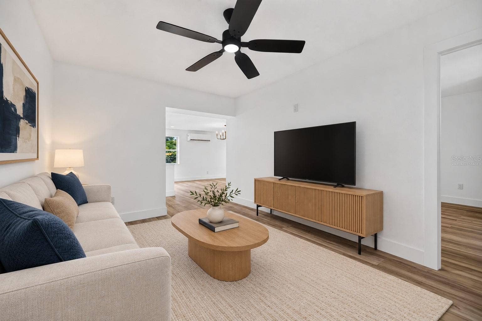 VIRTUALLY STAGED. First Floor Living Room