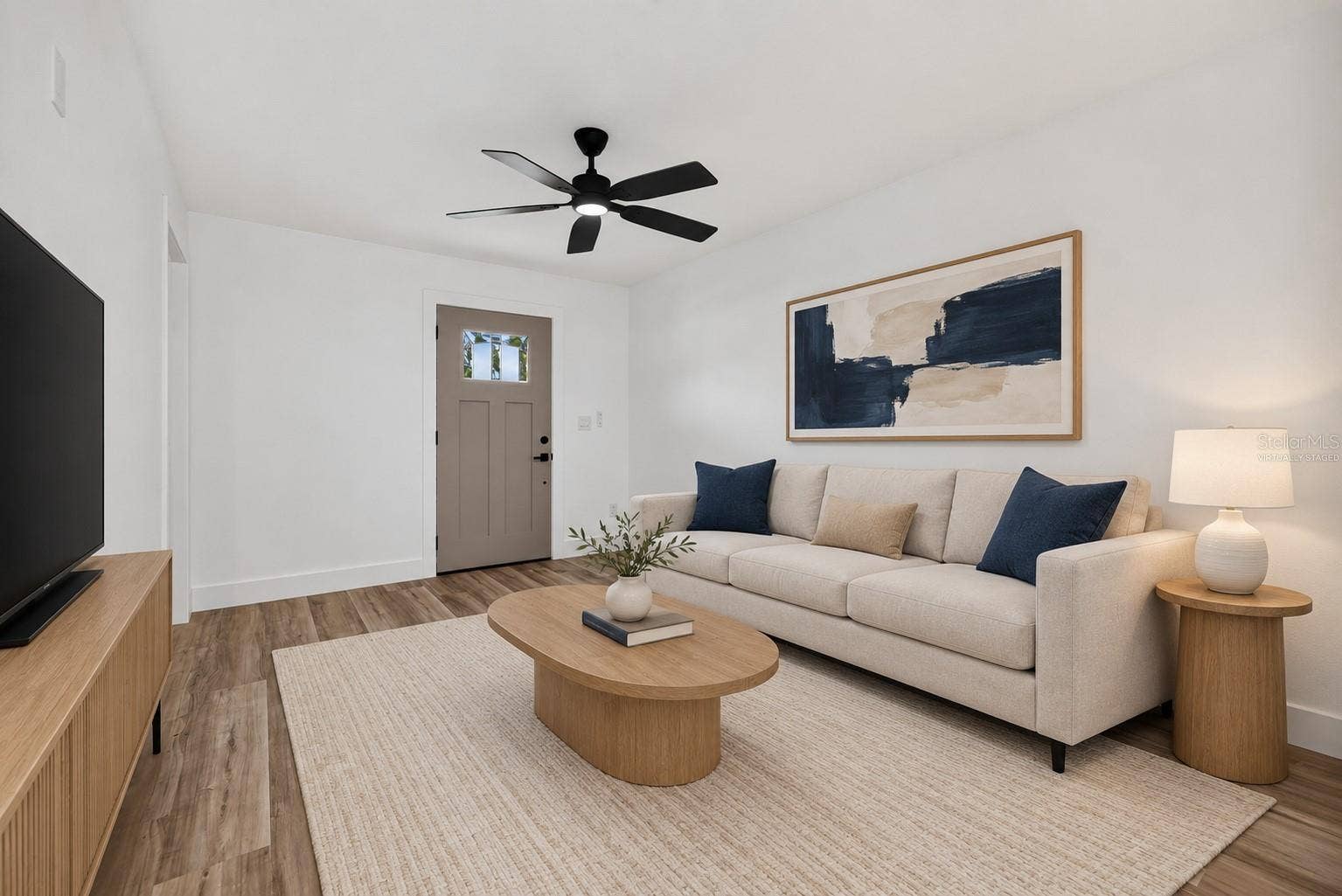 VIRTUALLY STAGED. First Floor Living Room