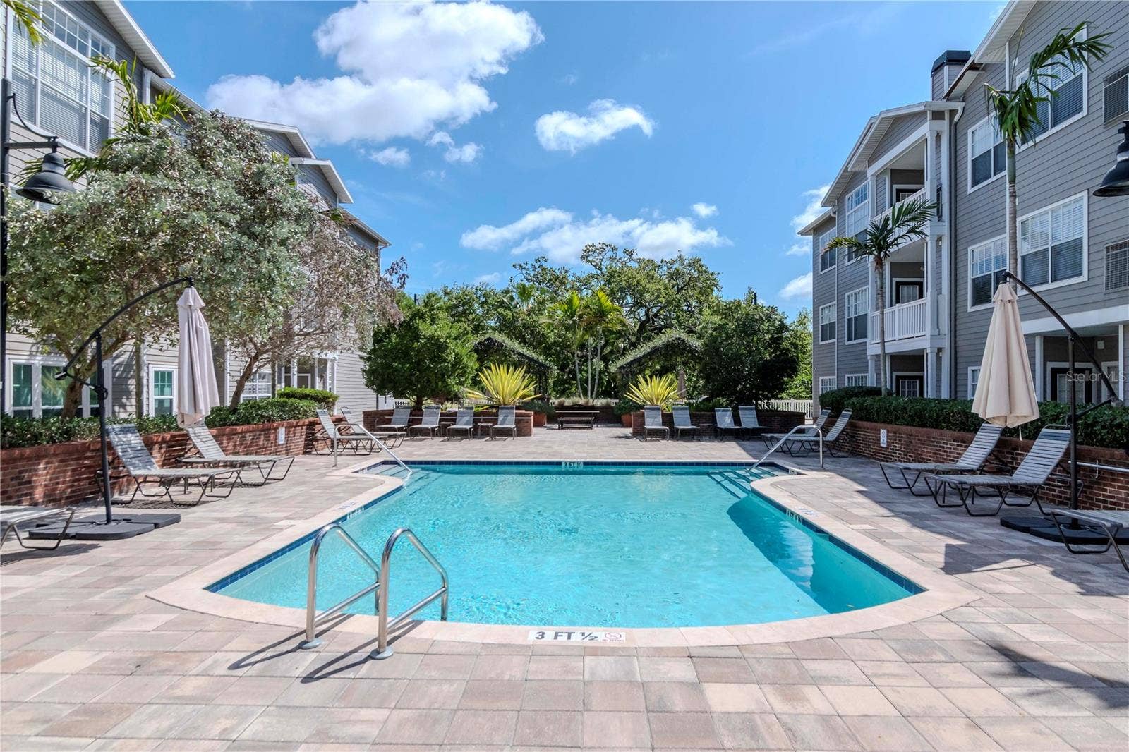 Enjoy the Community Pool & Grills which are Just a Few Steps From Your Front Door