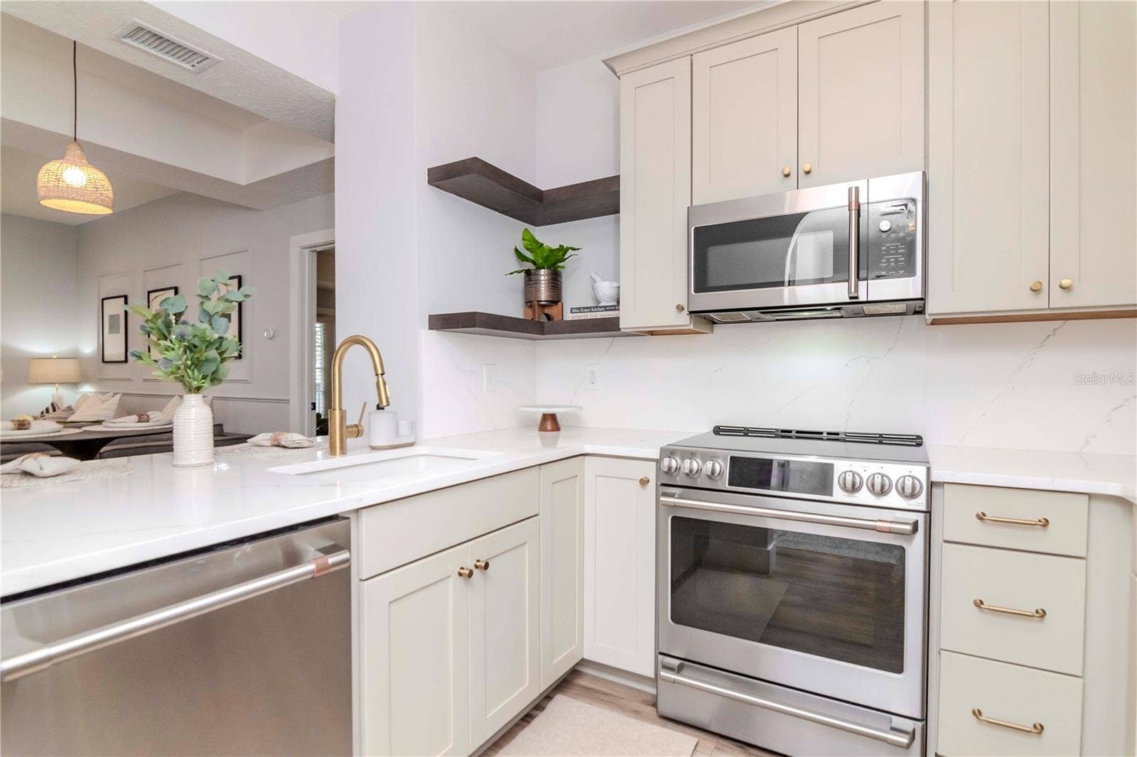Updated Kitchen with Custom Cabinetry, GE Cafe' Appliances, & Quartz Countertops