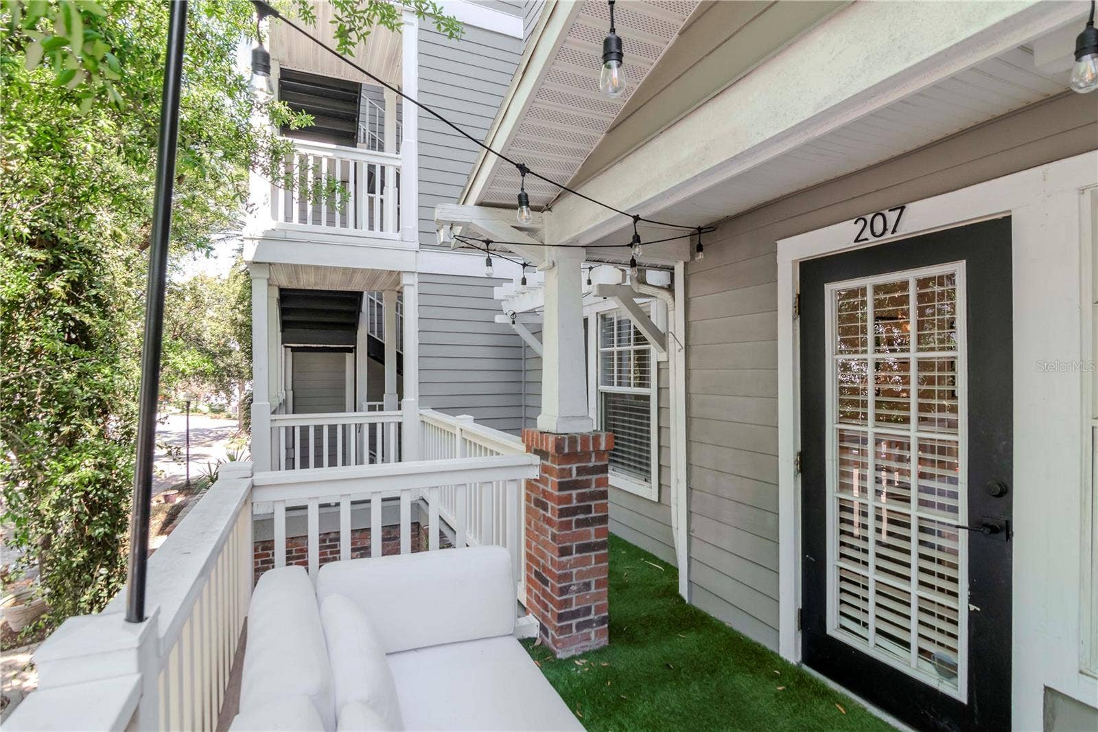 Perfect Spot for Morning Coffee or Evening Cocktails! Three Separate Interior Doors from Unit Open to Outdoor Patio