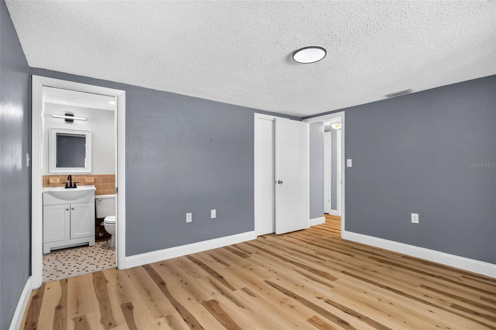 9516 GRAY FOX LANE, Port Richey, FL 34668 Main Bedroom with Private Bathroom