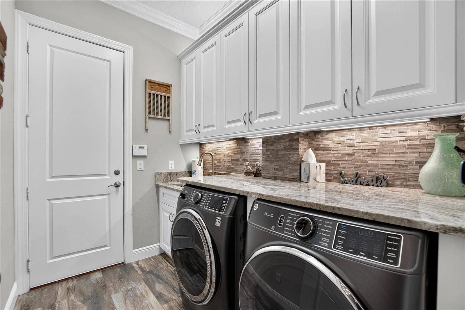 Interior Laundry Room w/Upgraded Cabinetry & Granite Countertops