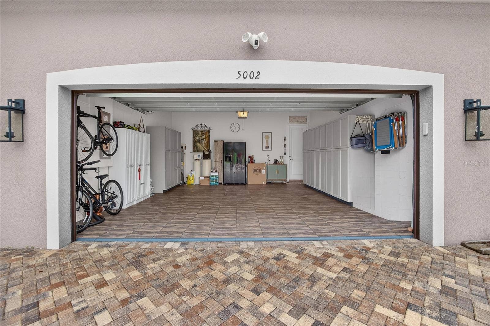 Air Conditioned Two-Car Garage with LVP Garage Flooring & Insulated Garage Door