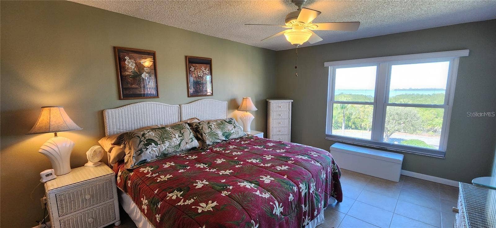 1806 MARINER DRIVE, #318, Tarpon Springs, FL 34689 The large primary bedroom has the gulf view.