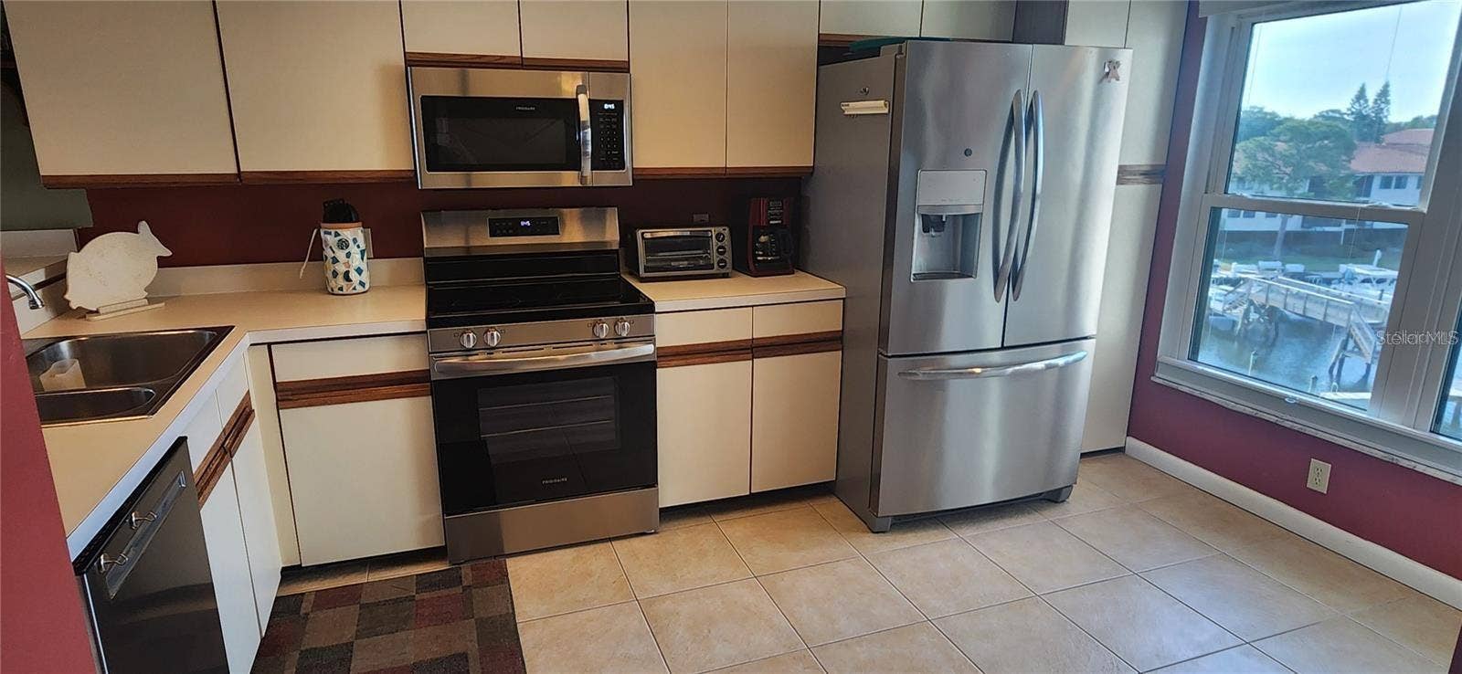 1806 MARINER DRIVE, #318, Tarpon Springs, FL 34689 Lots of natural light and stainless steel appliances.