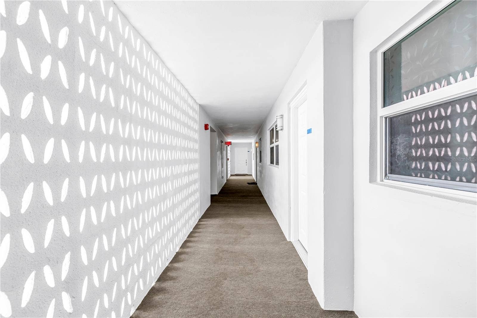 700 BEACH DRIVE NE, #201, St Petersburg, FL 33701 Hallway from Parking Garage