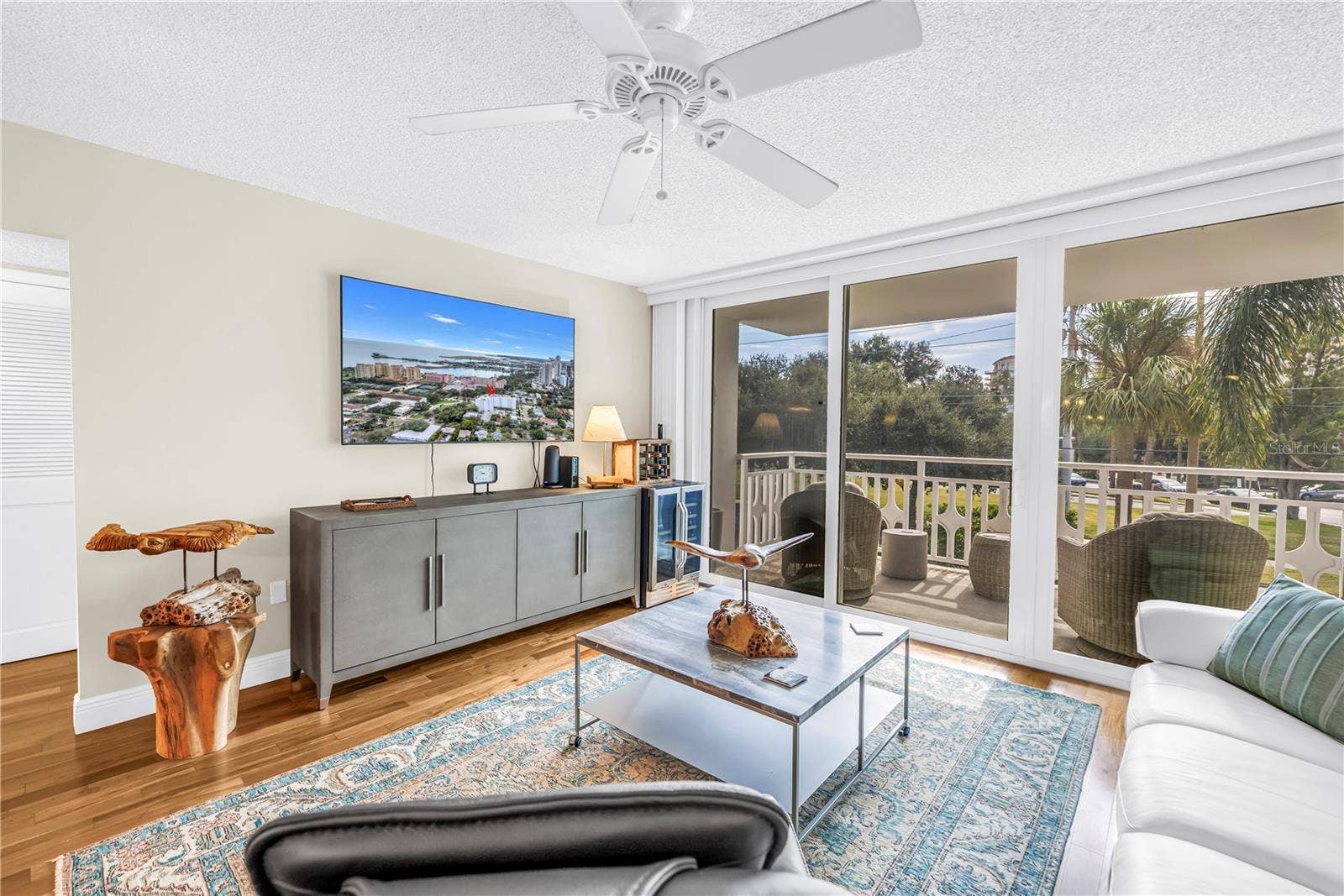 700 BEACH DRIVE NE, #201, St Petersburg, FL 33701 Living Room with Impact Sliders