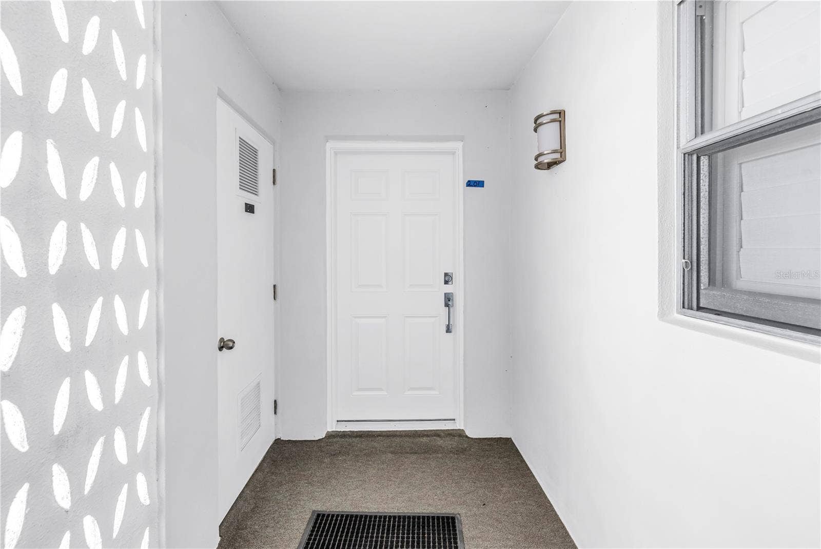700 BEACH DRIVE NE, #201, St Petersburg, FL 33701 Front Door and Storage Unit Door